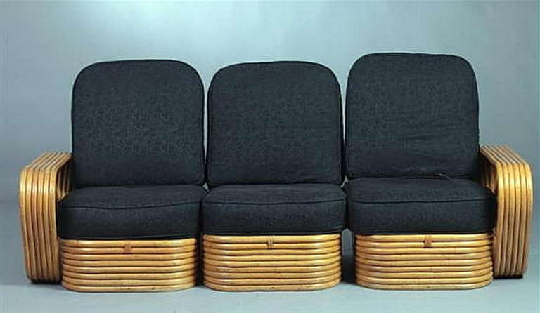 A Mid Century Three Seat Rattan Sofa Attributed To Paul Frankl. We Also Have A Set Of 2 Armchairs With An Ottoman And 2 Side Tables That Match This Set.