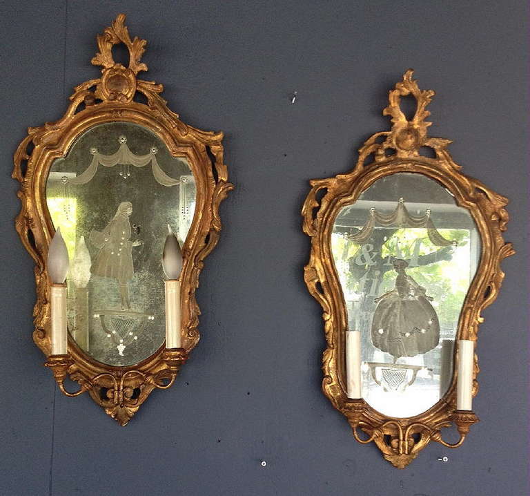 A Pair Of 18th Century Venetian Carved And Gilt Wood Sconces With Etched Venetian Glass Mirrored Backs.