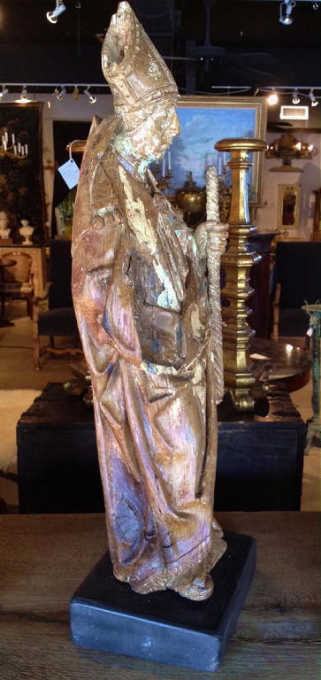 A Early 17th Century German Oak Carving Of A Bishop With Traces Of The Original Polychrome Painted Finish.