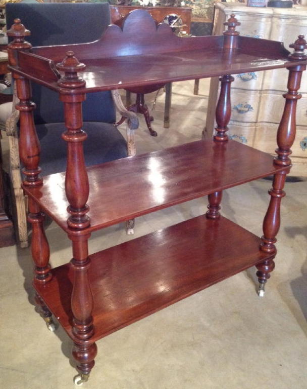 Early 19th Century English Mahogany 3 Tier Server or Dumbwaiter on Castors. Can Also Be Used As A Trolly Or Book Case.