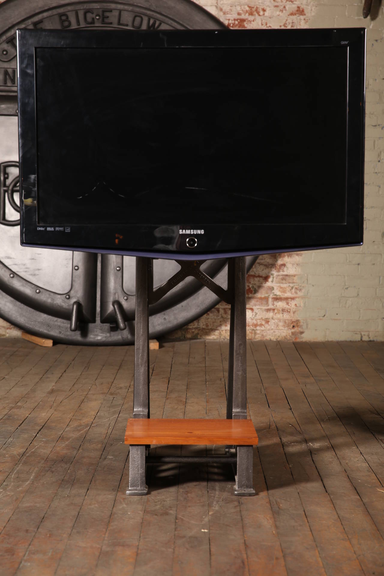 Vintage Industrial Steampunk Cast Iron Steel TV Media Screen Display Stand Table. Tilt angle is adjustable. Features wooden tray for media components. Originally a Factory Machine Stand. Labeled "H & A" "No 5"