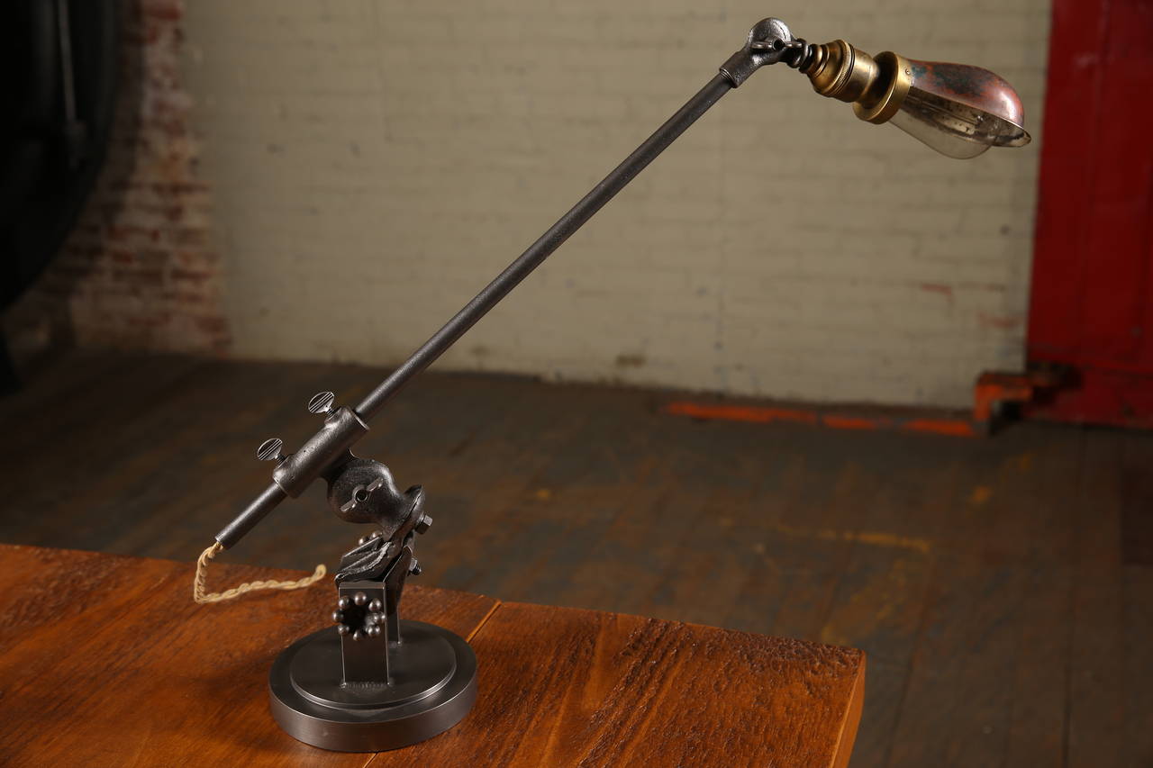 Cast Iron & steel industrial style adjustable task lamp, desk light. Arm measures 21