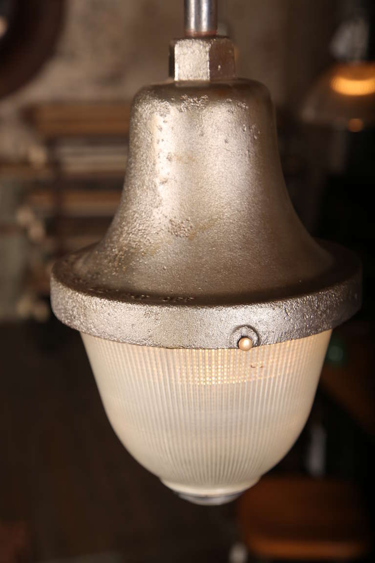 Vintage Industrial Holophane Train Station Light.  The height of the light is 12