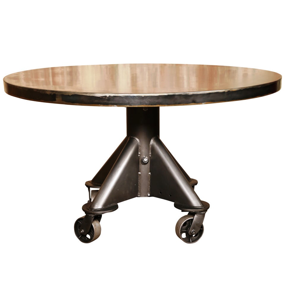 Vintage Industrial, 52" Round Metal Table with Cast Iron Casters