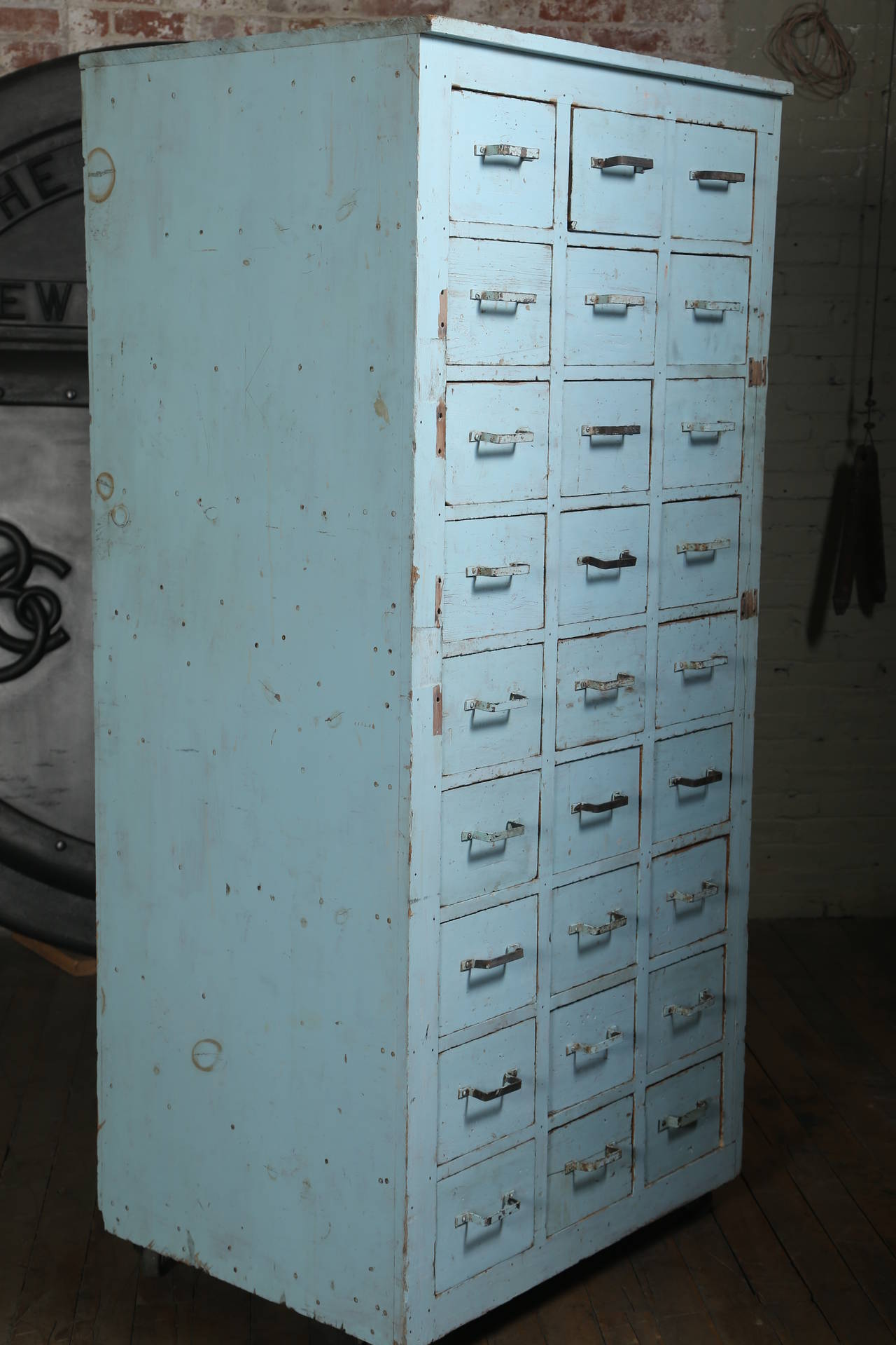 Vintage Multi-Drawer Wooden Storage Rolling Apothecary Distressed Cabinet For Sale 2