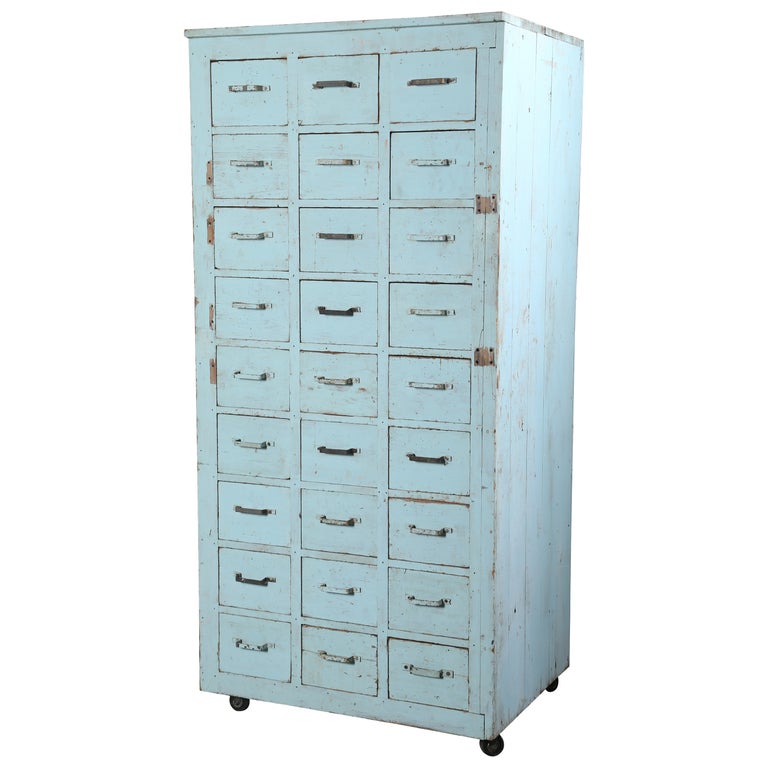 Vintage Multi-Drawer Wooden Storage Rolling Apothecary Distressed Cabinet For Sale