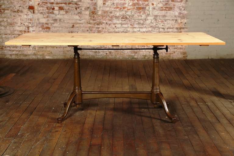 Vintage Industrial, cast iron tilt-top table with reclaimed wooden top and original paint.