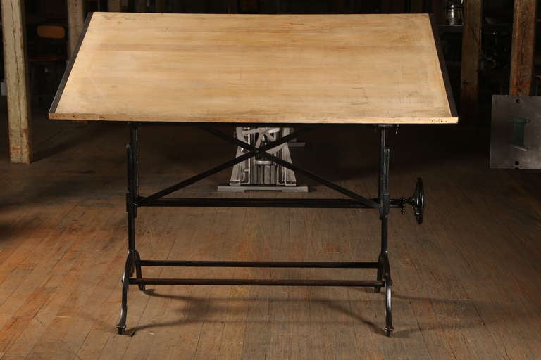 Vintage Industrial, Adjustable Drafting Table.  Original and in beautiful condition.  The table top adjusts from 31 1/4