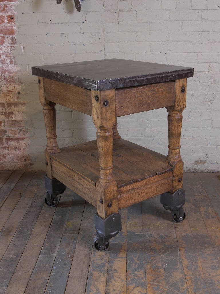 20th Century Wood, Steel and Cast Iron Turtle Table on Castors