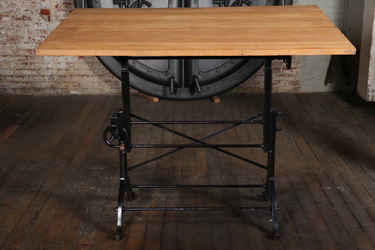 Original, Vintage Drafting Table made by The Frederick Post Company.

This drafting table adjust up to 48