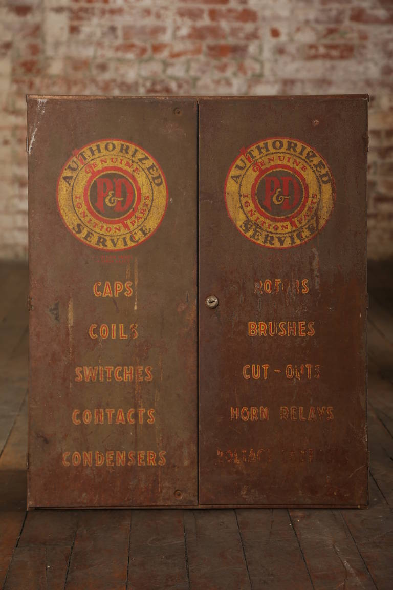 Vintage Industrial Steel, Metal, Rusted Rusty Storage Automotive Cabinet.  P&D Ignition Parts Cabinet. Cabinet measures: 23 1/4