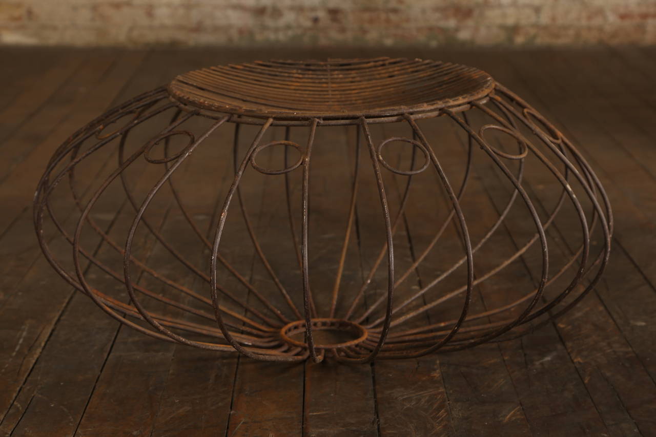 Vintage furniture. Round wire ottoman designed by John Risley. Ottoman measures 15 1/4