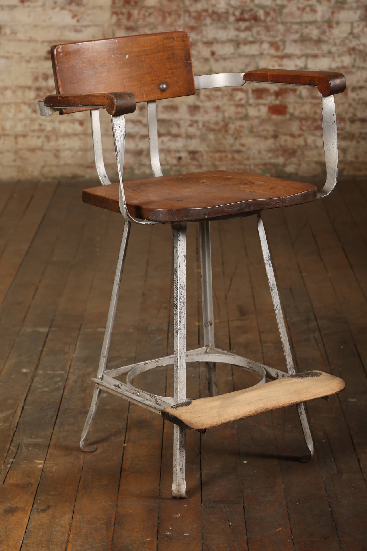 Unique, Vintage Industrial Stool with a Footrest. Seat height is 25