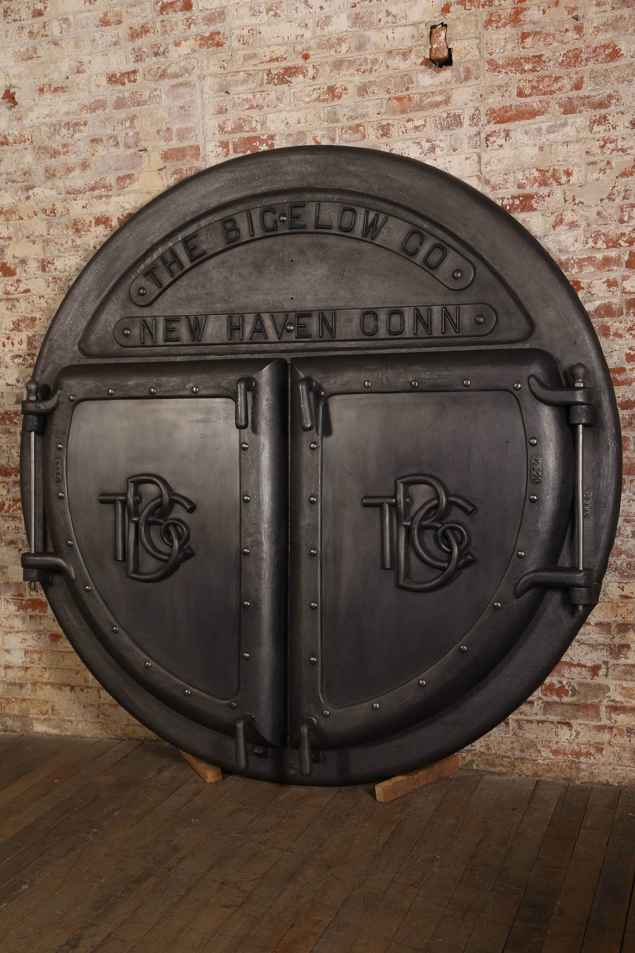 Outstanding Pair of 7' Foot Huge ' Vintage Industrial Cast Iron Boiler doors from the Bigelow Boiler Co. of New Haven, CT. 1924. Overall Dimensions are 85" in Diameter, 2 1/4" in Depth, 6" in Depth including Doors, and the Handles