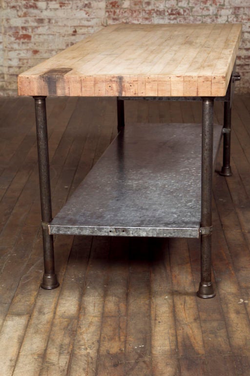 Maple Butcher Block Table with Utility Draw has a lower shelf raised about 11