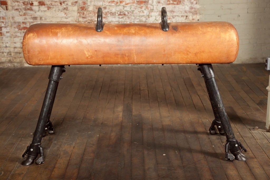 Original Vintage, American Made Pommel Horse.  Wheels for easy movement with locks for stability.  (Lowest pin settings dimensions are listed below.  Fully extended are 78