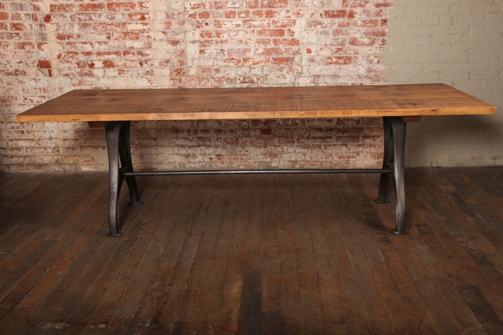 American made vintage Industrial cast iron and wood rustic dining, kitchen plank top "Brown & Sharpe" table. Cast iron legs with steel stretcher & rough sawn pine top. 