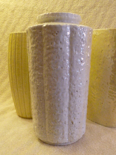 ...SOLD OCT 2012... Exceptional and captivating group of three tall fully marked vases by Gunnar Nylund (1904-1997) dating from the 1930's and produced by the Swedish firm Rorstrand.  Highly textural chamotte stoneware, the three distinctly varied