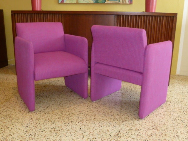 Fun pair of armchairs in the style of Mario Bellini and taking cues from the upholstered forms of Joe Colombo and Pierre Paulin of the period. This pair reupholstered in a vibrant houndstooth weave in blue and plum. Very comfortable with a
