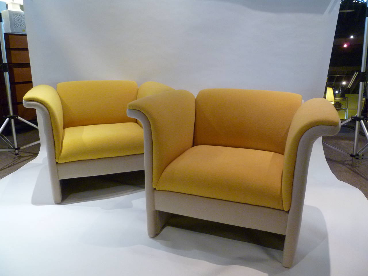 SOLD  With flared arms and back, these grand scale armchairs reflect the style of Dieter Rams 1960s designs. Freshly reupholstered in two toned micro loop Knoll fabric.

Measurements:
40 1/2