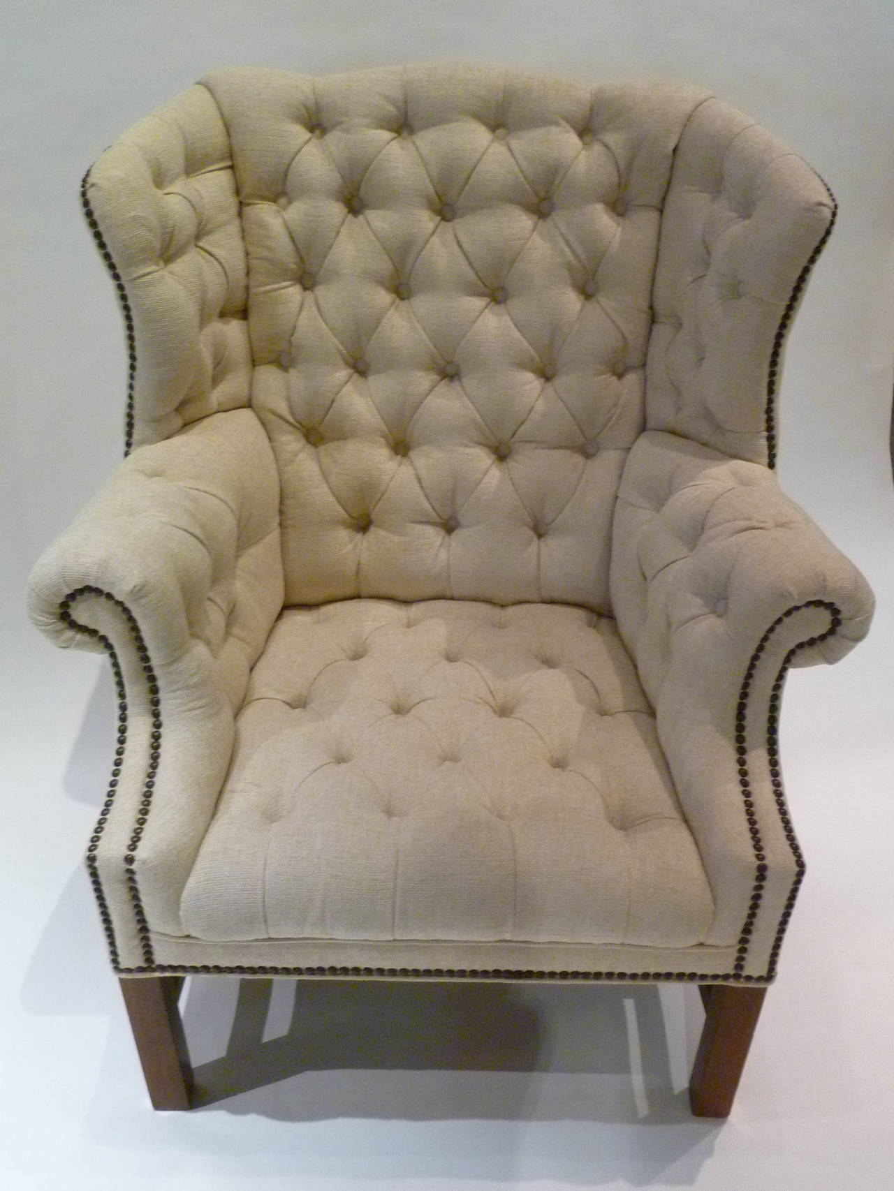 Pair of Chesterfield Style Tufted Wingback Armchairs In Excellent Condition In Miami, FL