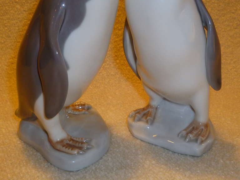 Reduced from $685. Beautiful, charming and whimsical, these pair of penguins in realistic tones is by world reknown Lladro, Spain's porcelain purveyors and created in 1984 by Fulgencio Garcia for Lladro. They were a limited production from