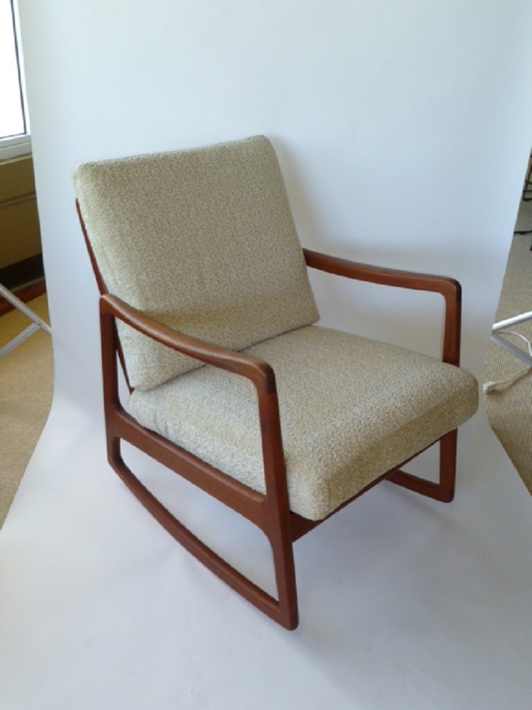 ...SOLD...Danish Master Ole Wanscher Teak Rocker for France & Daverkosen and imported by John Stuart.  Excellent condition, John Sturat tag, France & Daverkosen gold stamp.  Spring upholstered cushions.

For trade pricing and shipping please