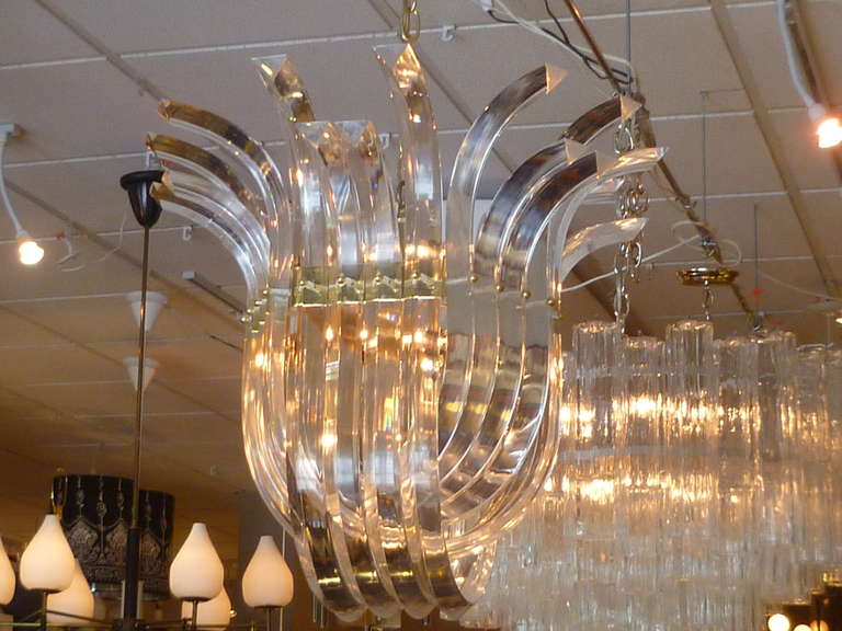 American Dramatic Crowned Lucite Ribbon Swag Chandelier