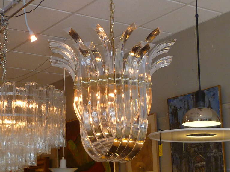 Late 20th Century Dramatic Crowned Lucite Ribbon Swag Chandelier