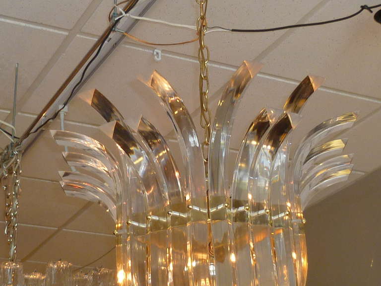 Dramatic Crowned Lucite Ribbon Swag Chandelier 1
