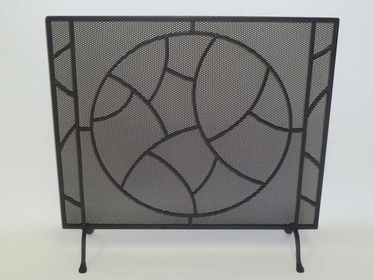 SOLD Wonderful wrought iron mid-century creation in a modernist  cubist inspired theme of a fractured circle and side panels....a decidely art deco style.

Measures:  31