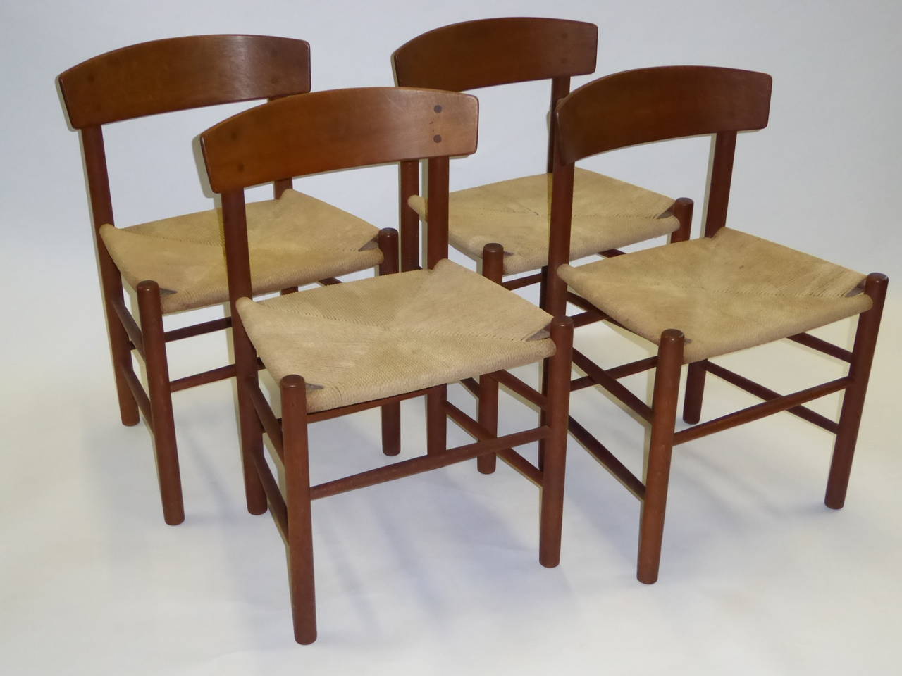 SOLD  Four J39 Chairs designed by Børge Møgensen in 1947 for FDB Mobler  of Denmark.  An iconic Shaker style chair, these in soaped oak with Danish paper cord seats.  The four in beautiful oak are in excellent sound condition, with the seats having