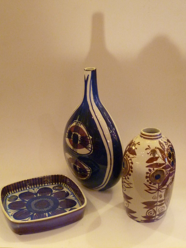 This grouping of three faience pieces from the Royal Copenhagen / Aluminia line Tenera designed by Nils Thorssen in the 1960s has a wonderful aura. These three were decorated with organic stylized floral motifs by three women artists, all Danes and