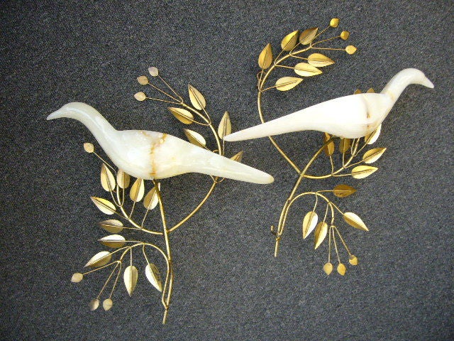 Stunning, remarkable and rare C. Jere´ wall sculptures of carved onyx doves in exquisite brass metalworked branches with leaves and olives. Mirror imaged, the two parts of the sculpture can be hung in myriad ways facing each other, facing apart,