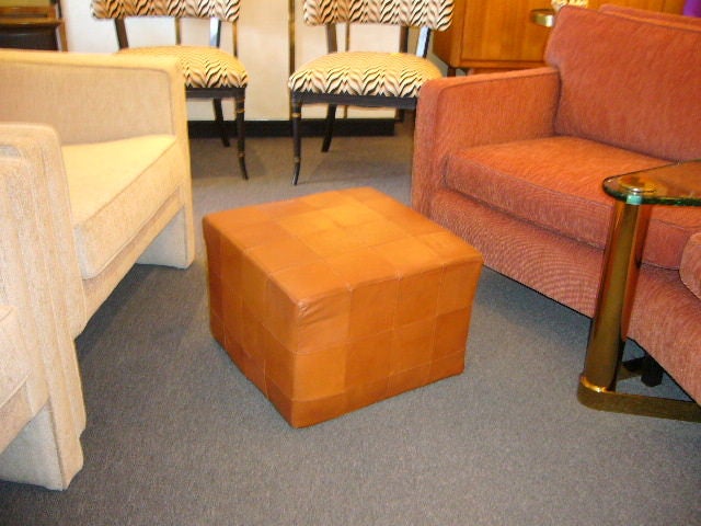 ...SOLD APRIL 2012...Warm, masculine & rich Danish leather patchwork ottoman....or use it as a side table.  A great pull up seat.  Large enough for two sets of feet or a large tray making a coffee table.  Good size...18