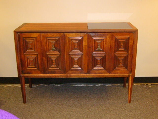 ...SOLD NOVEMBER 2011...Very, very charming server sideboard drybar from John Stuart...part of the Casalinda Collection in warm, very figured walnut with quarter molding on the folding doors that open to drawers on one side and an open cabinet on