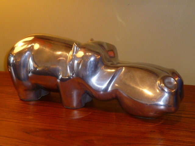 ...SOLD FEB.2012...Really great and whimsical sculpture by David Parkin, noted for his animal creations.  In high polished cast aluminum and signed in the metal, the hippo in cartoonish with elongated face and exagerated features.  Sweet and