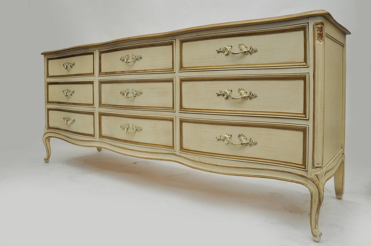 Large nine-drawer Hendredon dresser in cream with gold guild.