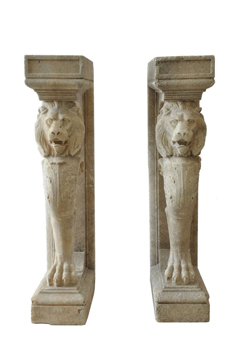 Vintage Lion Pedestals - Circa 1920s. Aged concrete with natural patina. Combined w/stone, marble, or concrete top, console would make a beautiful addition to any patio, pool, or garden landscape. 

Dimensions:  38.5