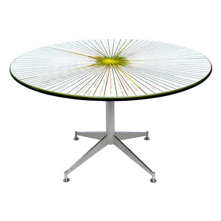 Colorful sunburst 1970s orange, green, yellow and white round formica topped pedestal base table.