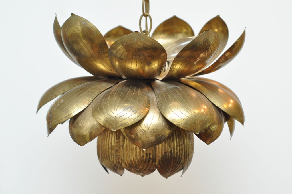 Interesting Brass lotus style hanging chandelier circa the 1960s.  detailed brass leaves<br />
Light has one down light (single bulb) and three up lights - visible in pictures.
