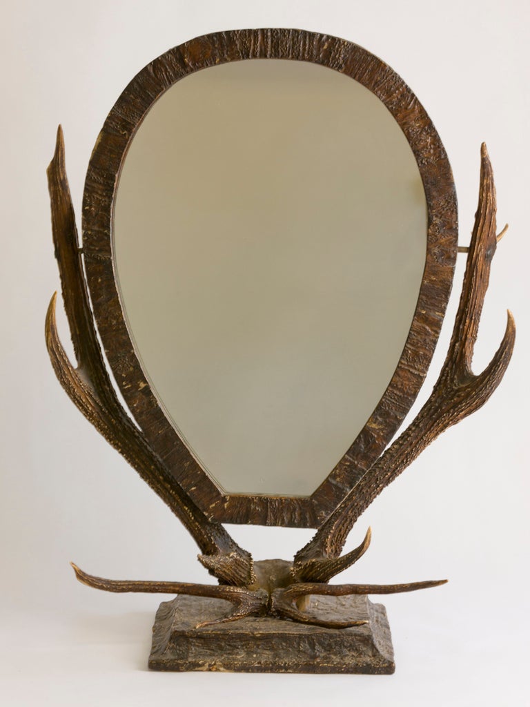 French oval standing mirror with horn detail. Mirror is constructed on papier mache, horn and wood.