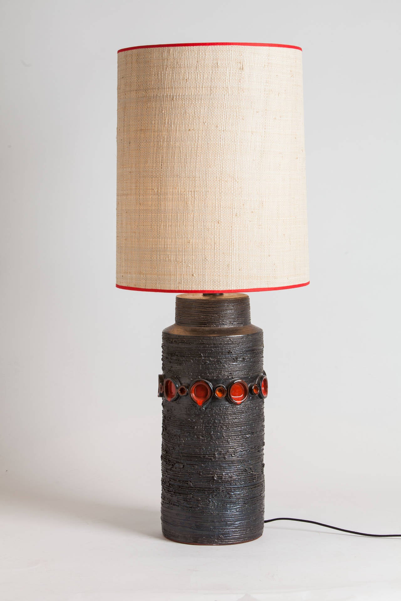 Wonderful ceramic table lamp by Belgium designer Perignem. Features custom Japanese straw shade made in Paris. Rewired for the US.