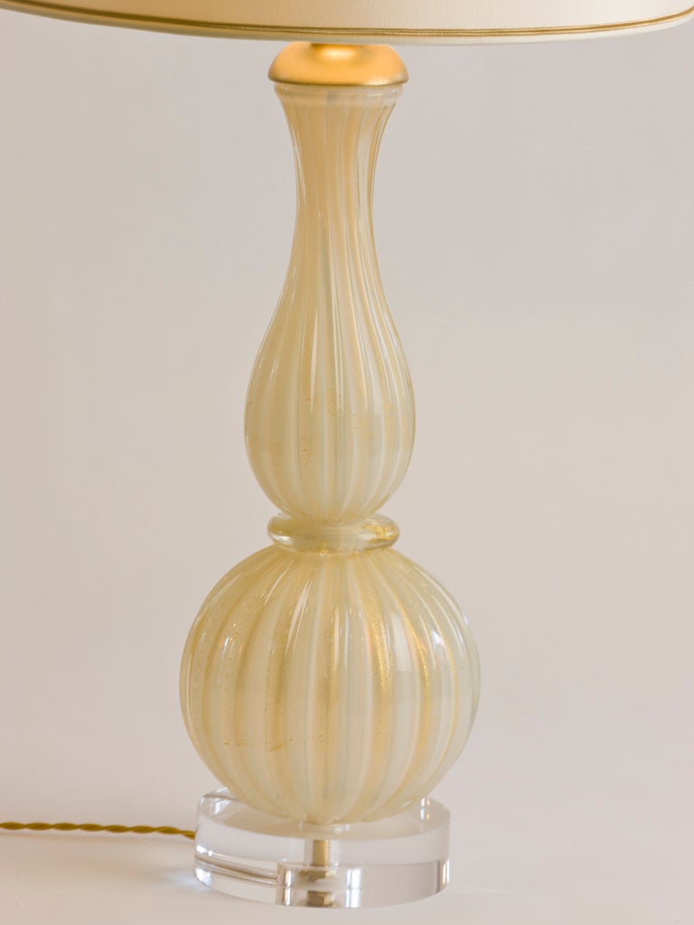 Vintage Murano table lamp in white with gold mica accent.