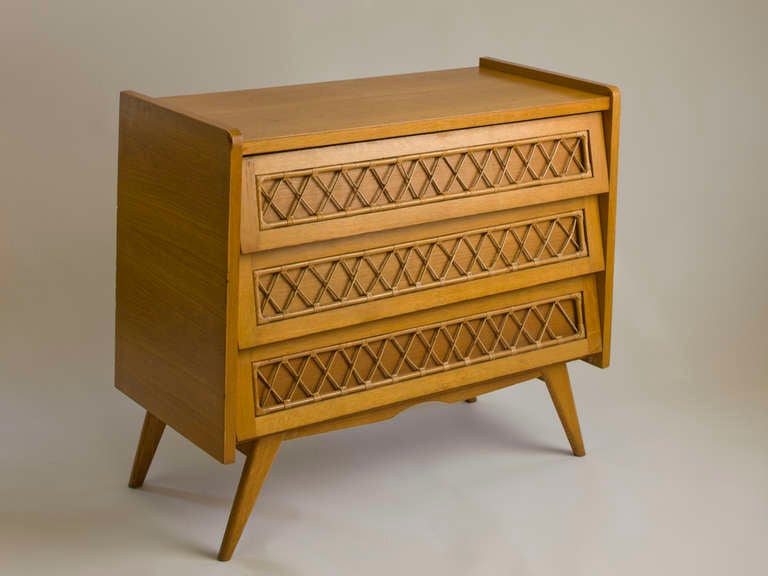 French three drawer bureau with rattan accent.