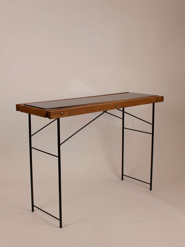 Italian wood, metal and smoked glass console.