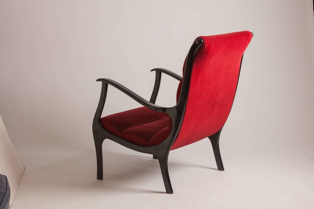 Pair of red velvet armchairs by Italian designer Ezio Longhi. Wood is in pristine condition.