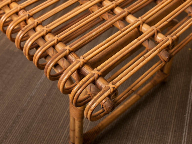 curved rattan bench