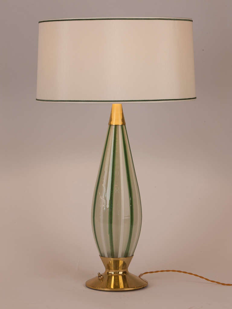 Beautiful vintage Murano lamp in green and white stripe.  Original brass base and neck in pristine condition.  Custom silk shade made in Paris.