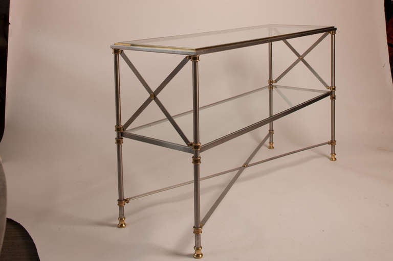 Lovely chrome, brass and glass two-tier console by Maison Jansen.